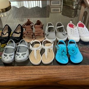 7 barely used little girls size 5 shoes.  Purchased from TJ Maxx.